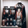 the priority protein, the isolation whey isolate protein, the xplode pre workout, the revival essential amino acids, the heal glutamin and the mettle tri creatine with the Roelly Winklaar's tatto jacket.